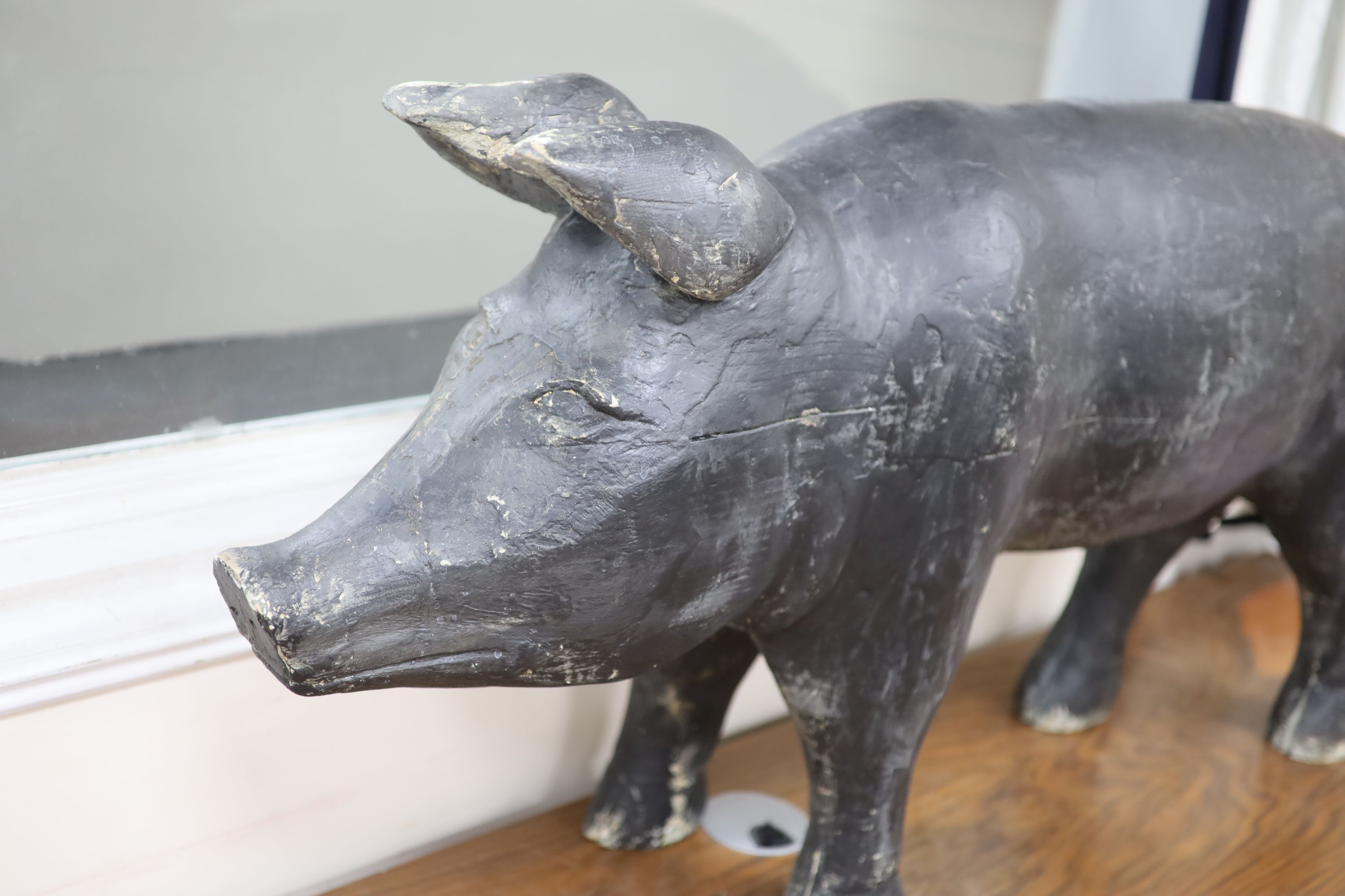 A vintage painted carved wood model of a standing pig, length 120cm